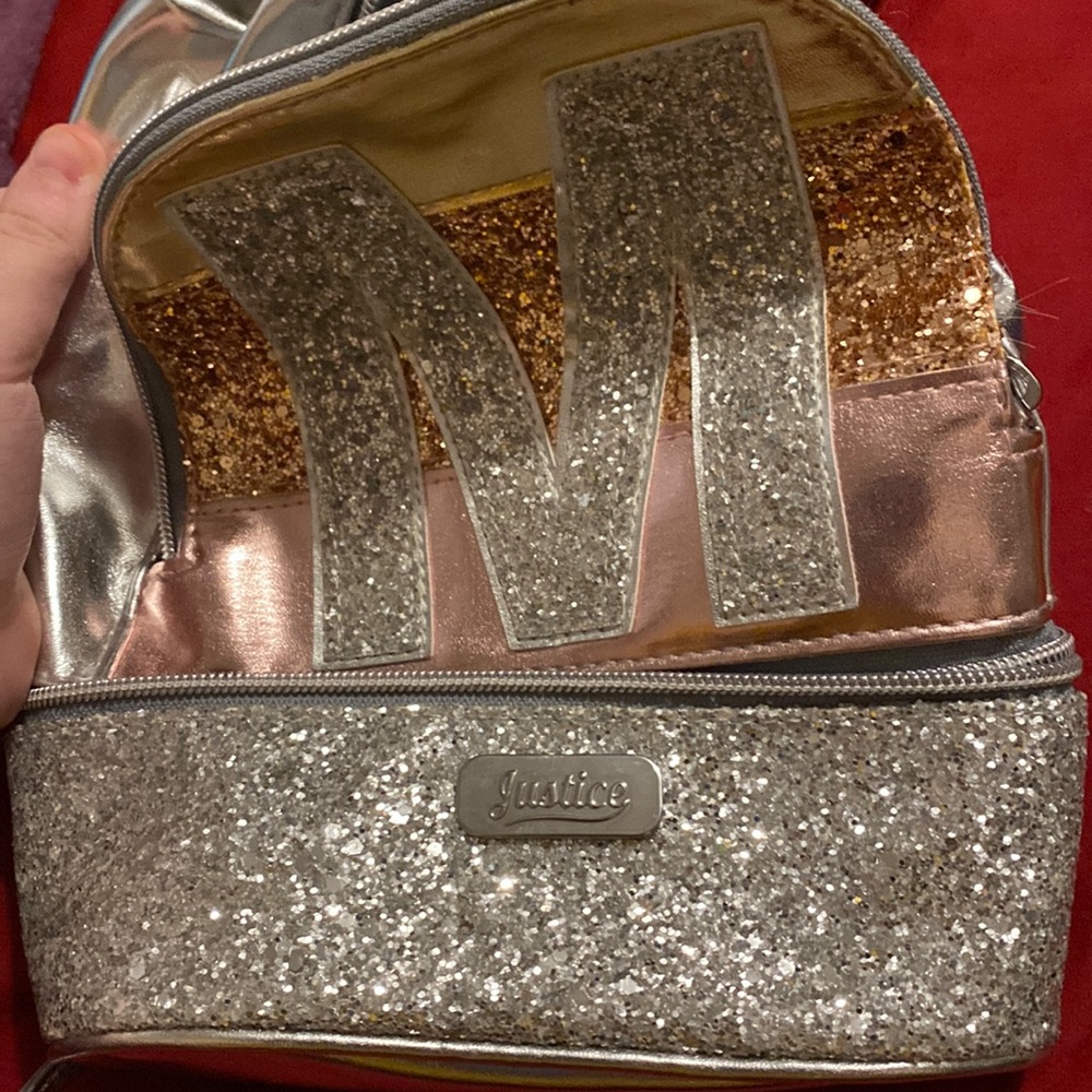 Small girls backpack sparkly with pink and an M on it
